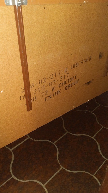The information on the back of a dresser.