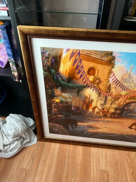 The left side of a framed print.