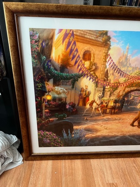 The left side of a framed print.