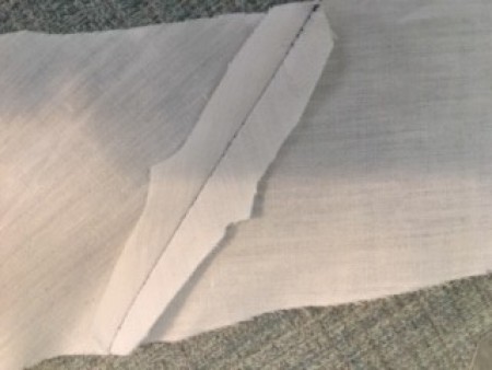 The seam in the lining fabric.
