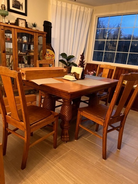 An antique oak dining table.