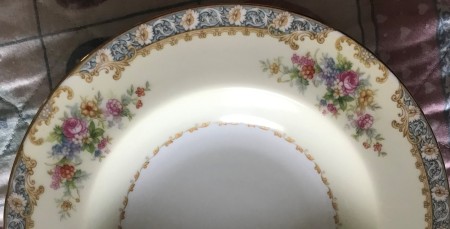 The floral pattern on a set of china.