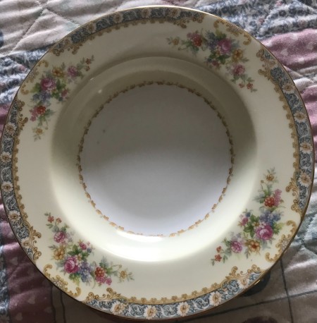The floral pattern on a set of china.