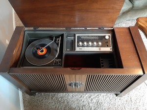 A stereo cabinet.