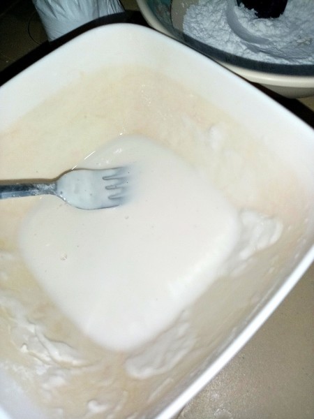 The wet flour coating in a bowl.