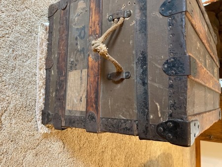 The side of a steamer trunk.