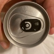 A can with a misprinted tab.