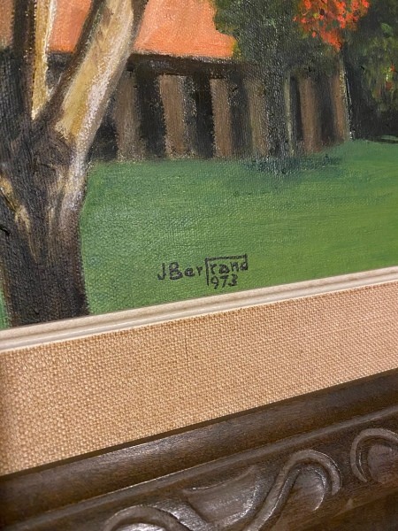 The artist's signature at the bottom of a painting.