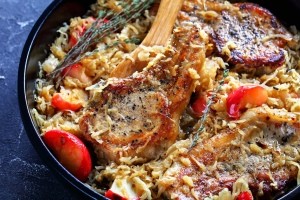 A casserole containing pork chops.