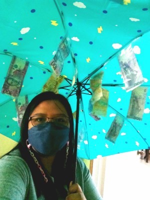 The surprise money umbrella.