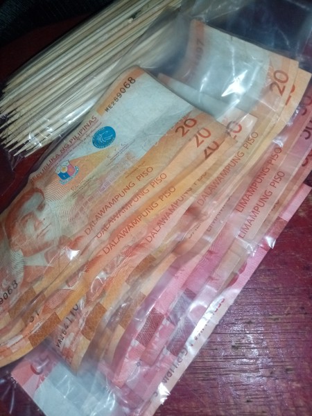 Money wrapped in plastic.