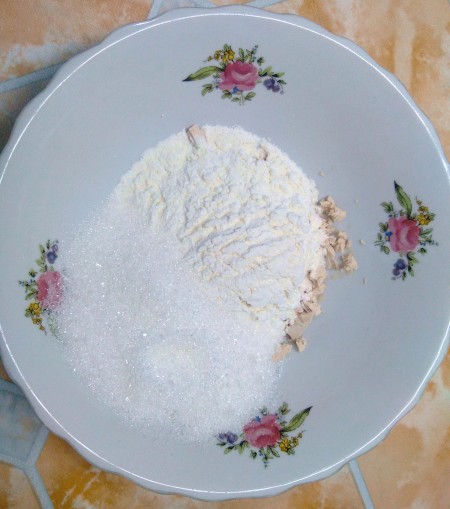 Mixing dough ingredients.