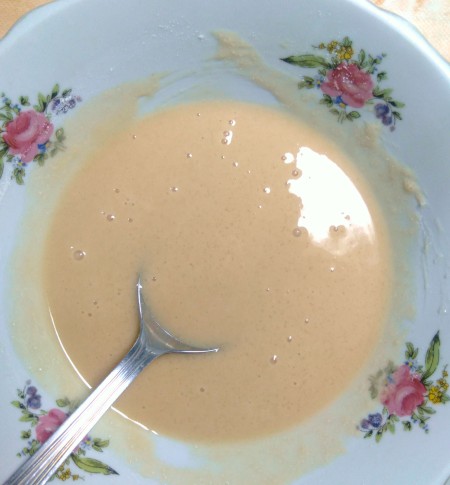 Mixing dough ingredients.