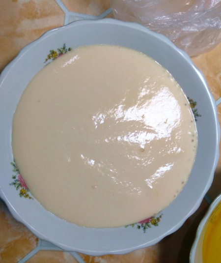 Mixing dough ingredients.