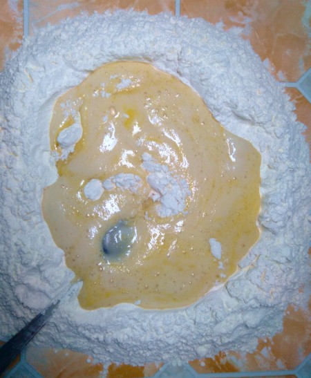 Adding the wet ingredients to the dry.