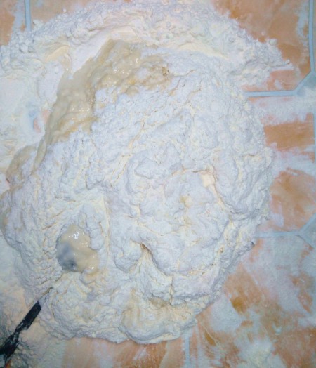 Mixing dough ingredients.