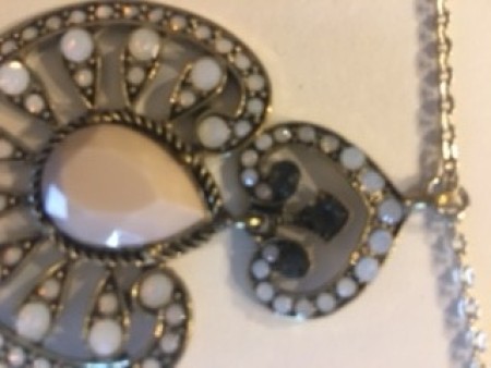 Attaching jewelry to the chain.