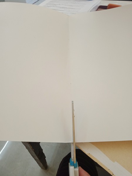 Cutting the cardstock.