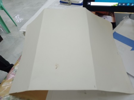 The folded cardstock.