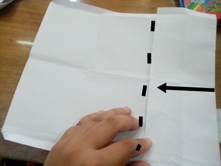 Folding the paper.