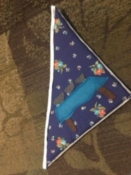 A triangular piece of fabric.