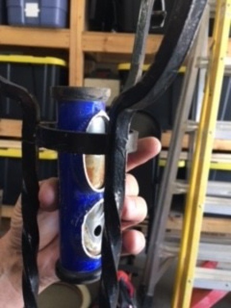 Attaching the bike frame to the plant stand.