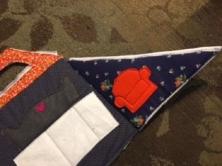 Assembling the fabric playhouse.