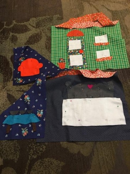 Assembling the fabric playhouse.