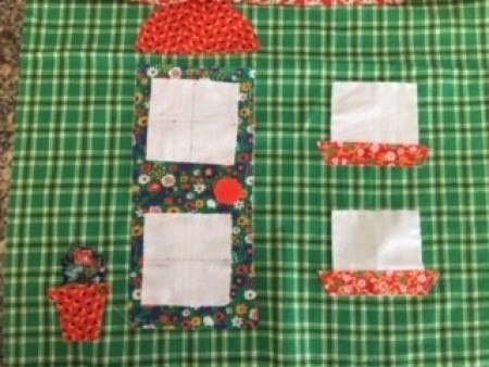 Small pieces of fabric sewn together.