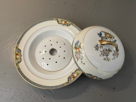 A china serving dish with lid.