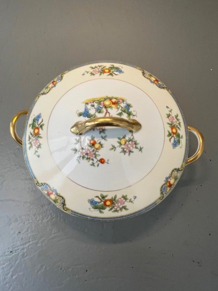 The top of a china serving dish.