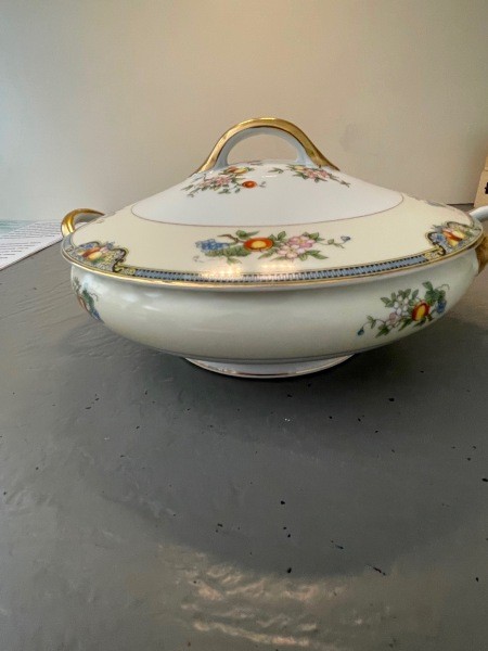 The side of a soup tureen.
