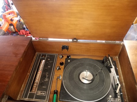 A vintage record player cabinet.