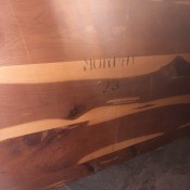 Markings on a cedar chest.
