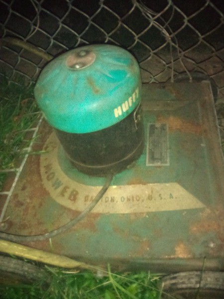 A vintager lawn mower.