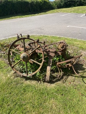 An old rusted piece of farm equipment.