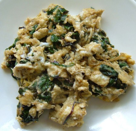 Scrambled eggs with beet greens.