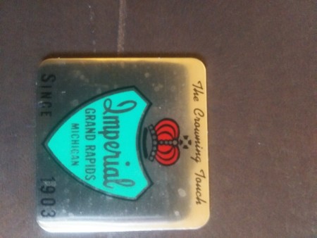 An Imperial Furniture logo.