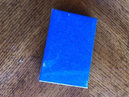 A blue box of playing cards.