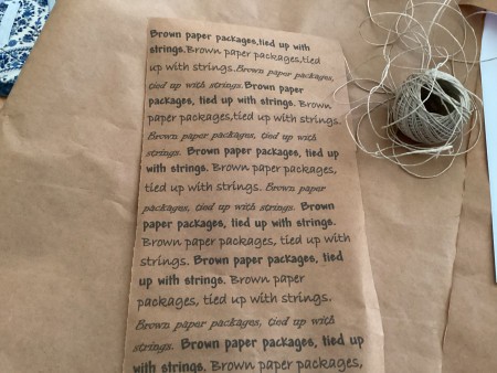 A sheet of craft paper with text printed on it.