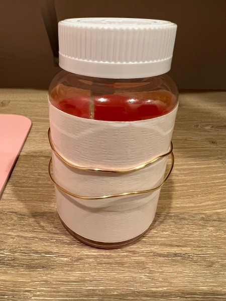 Wrapping wire around the container.