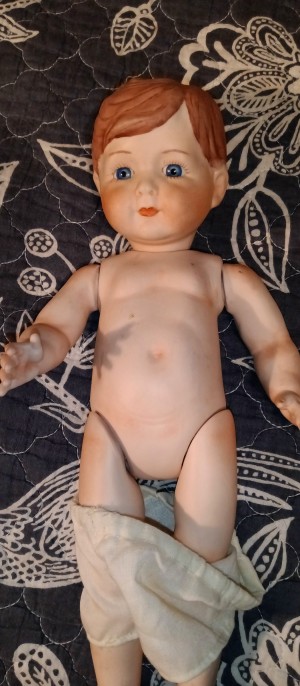An old posable doll toy.