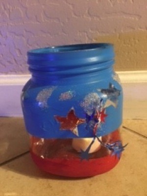 The completed 4th of July candle jar.