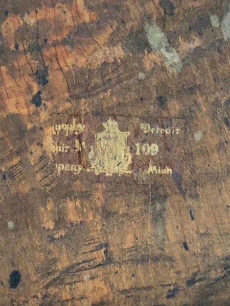 A marking on the back of a chair.