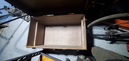 The open steamer trunk.