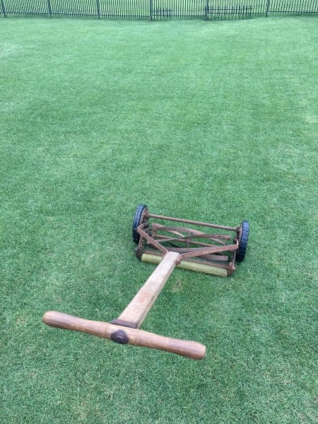 An old fashioned reel mower.