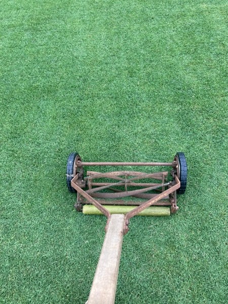 An old fashioned reel mower.
