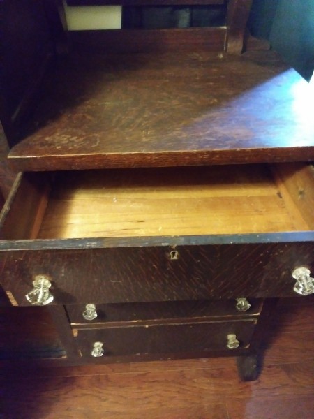 An open drawer of the wardrobe.