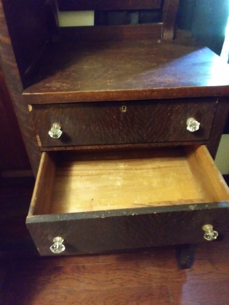 An open drawer of the wardrobe.