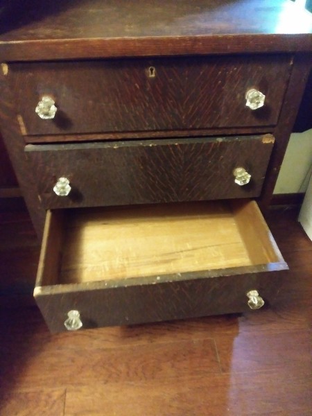 An open drawer of the wardrobe.